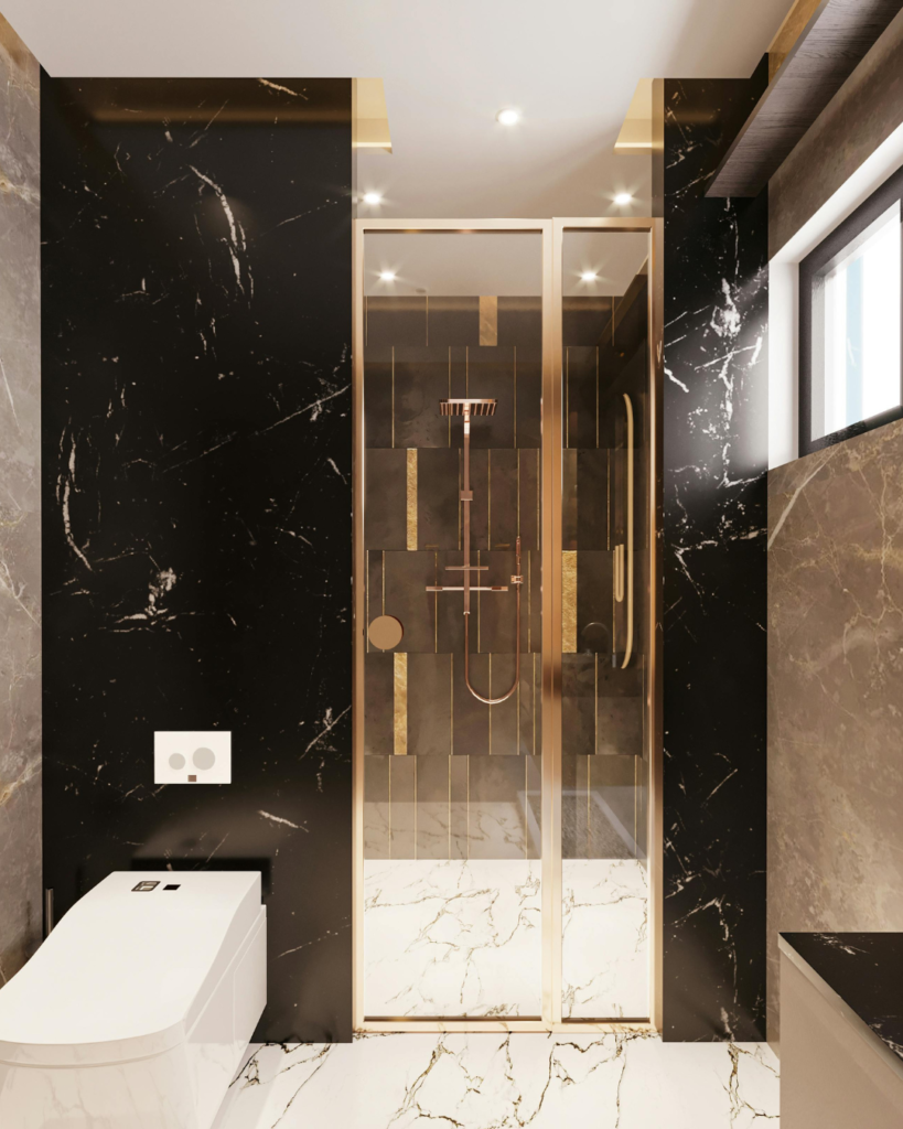Luxurious bathroom with black marble walls, a gold-framed glass shower enclosure, and a white marble floor.